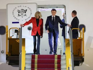Macron’s office plays down video showing apparent shove from wife in Vietnam