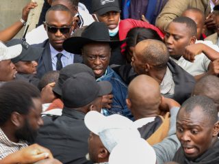 Supporters escort Rigathi Gachagua from JKIA after US trip