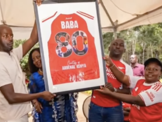Kenyan Arsenal fans visit Raila Odinga’s grave in Bondo