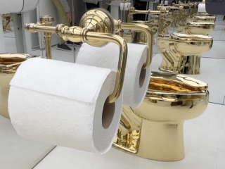 18-karat gold toilet sells for $12 million at auction