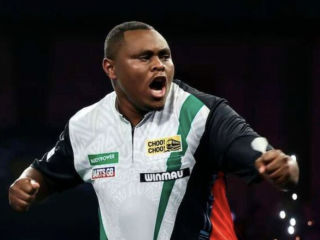 Kenyan darts sensation David Munyua returns to a hero’s welcome