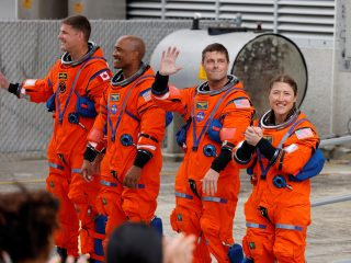 NASA launches four astronauts on world’s first crewed moon mission in half a century