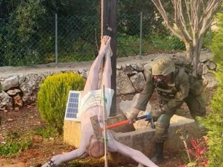 Outrage after photo captures Israeli soldier destroying Jesus statue in Lebanon