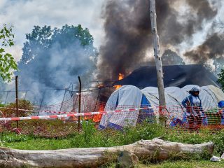 Congo protesters set fire to Ebola treatment tents in dispute over victim’s body