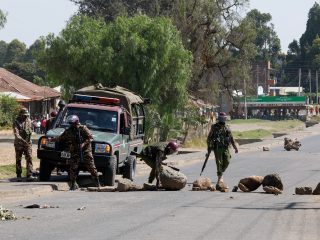 Police deploy tear gas during protests against US Ebola facility in Nanyuki