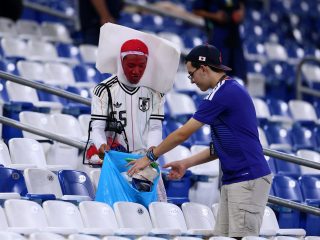 Japanese fans clean up World Cup stadium after win against Tunisia