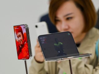 Apple joins foldable phone race with $1,999 passport-shaped iPhone Duo